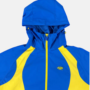 
                  
                    Syna Logo Vortex Woven Jacket - Blue/Yellow
                  
                