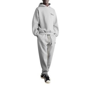 
                  
                    Fear Of God Essentials Light Heather Grey Tracksuit (FW24)
                  
                