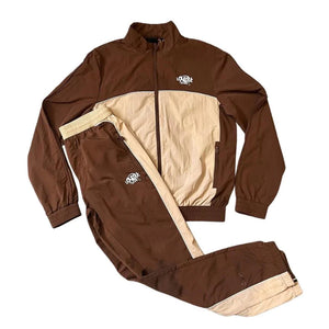 
                  
                    Syna World “Syna Logo Shell Tracksuit - Brown/Beige
                  
                